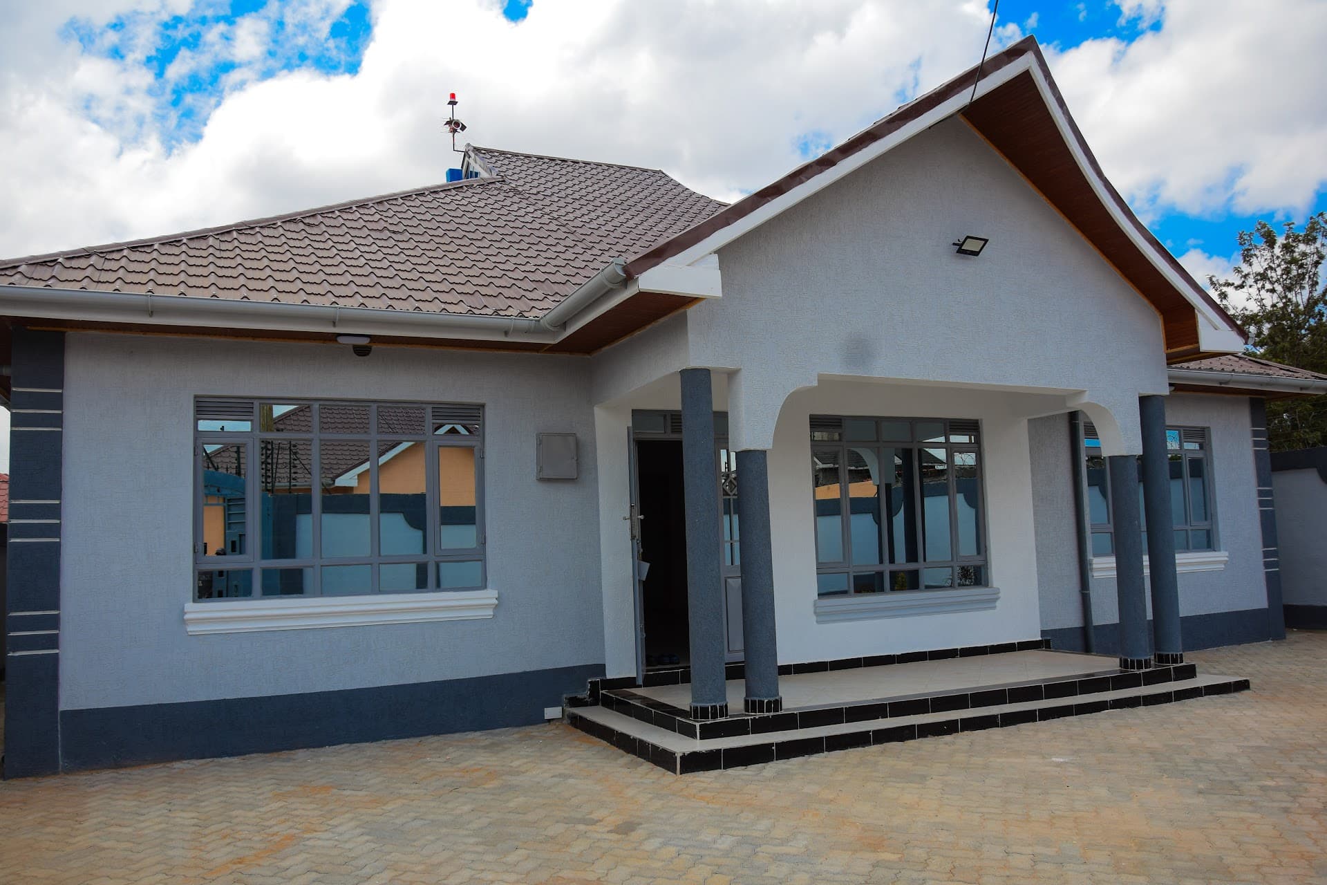 Sambright Architectural Exterior Painting — Karen Contemporary Villa